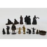 A collection of bronze figures to include Victorian style ladies, gentlemen, servants,
