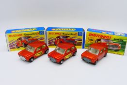 Matchbox - 3 x boxed Racing Mini models in metallic orange,