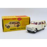 Dinky - A boxed Morris MIni Traveller in cream with red interior # 197.