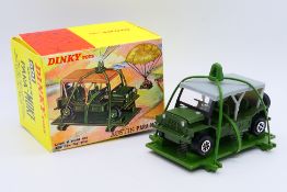 Dinky - A boxed Austin Para-Moke in Army green with Speedwheels # 601.