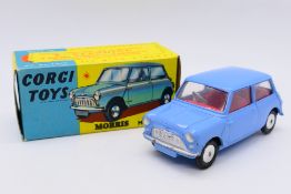 Corgi - A boxed Corgi Morris Mini Minor in blue with a red interior and smooth wheel hubs # 226.