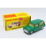 Dinky - A boxed Morris Mini Traveller in green with lemon interior # 197.