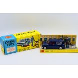 Corgi - A boxed B.M.C. Mini Police van with Policeman and tracker dog # 448.