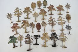 Scenics - A quantity of cast metal model trees, various sizes and styles,