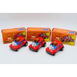 Matchbox - 3 x boxed Mini Ha-Ha models in red with differences in the flesh colour of the driver #