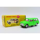 Dinky - A boxed Morris Mini Traveller in fluorescent green # 199.