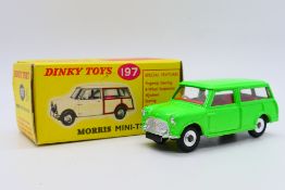 Dinky - A boxed Morris Mini Traveller in fluorescent green # 199.