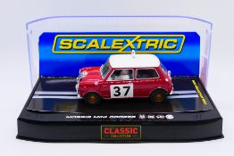 Scalextric - A cased Paddy Hopkirk 1964 Morris Mini Cooper S # C2919.