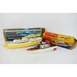 Tri-ang - 2 x boxed battery powered model boats, a Derwent 14" Cabin Cruiser # 414S and R.M.S.