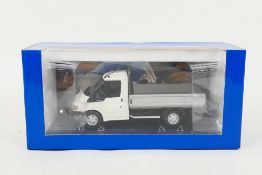 Paul's Model Art / Minichamps - A boxed diecast 1:43 scale Ford Transit Chassis Float by Paul's