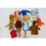 Pedigree - Sindy - 2 x vintage Sindy walker dolls with additional clothing.