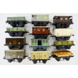 Hornby - 12 x O Gauge wagons including Guards van, cattle wagon, tipping wagon,
