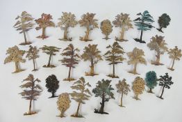 Scenics - A quantity of cast metal model trees, various sizes and styles,