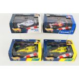 Hot Wheels - 4 x boxed Hot Wheels 1:43 die-cast race cars - Lot includes a #24625 Williams FW21