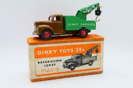 Dinky - A boxed Commer Breakdown Lorry in a very dark shade of the usual tan cab with red wheels