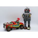 Yoneya - Nomura - 2 x vintage powered tinplate models, a clockwork walking robot with moving arms,