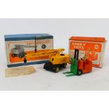 Dinky - 2 x boxed models, a Coles Mobile Crane # 571 and a Coventry Climax Fork Lift Truck # 14c.