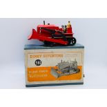 Dinky - A boxed Blaw Knox Bulldozer in red with green tracks # 561.
