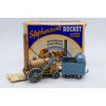 Benbros Qualitoys - A boxed Stephenson's rocket with coal tender.