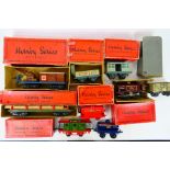 Hornby - Bing - A boxed O gauge tank engine, 7 x boxed wagons and an unboxed wagon.