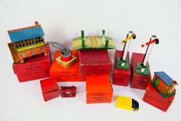 Hornby - A collection of boxed o gauge accessories including signal cabin # 42370,