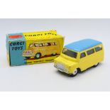 Corgi - A Bedford CA Dormobile in yellow with a blue roof # 404.