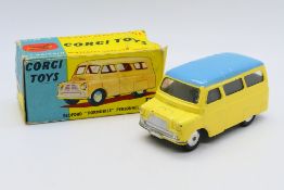 Corgi - A Bedford CA Dormobile in yellow with a blue roof # 404.