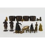 A collection of bronze figures to include Victorian style ladies, gentlemen, children, dogs,