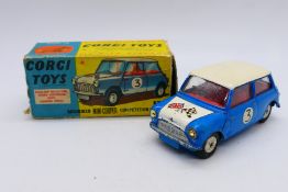 Corgi - A Morris Mini Cooper Competition model in blue with racing number 3 # 227.