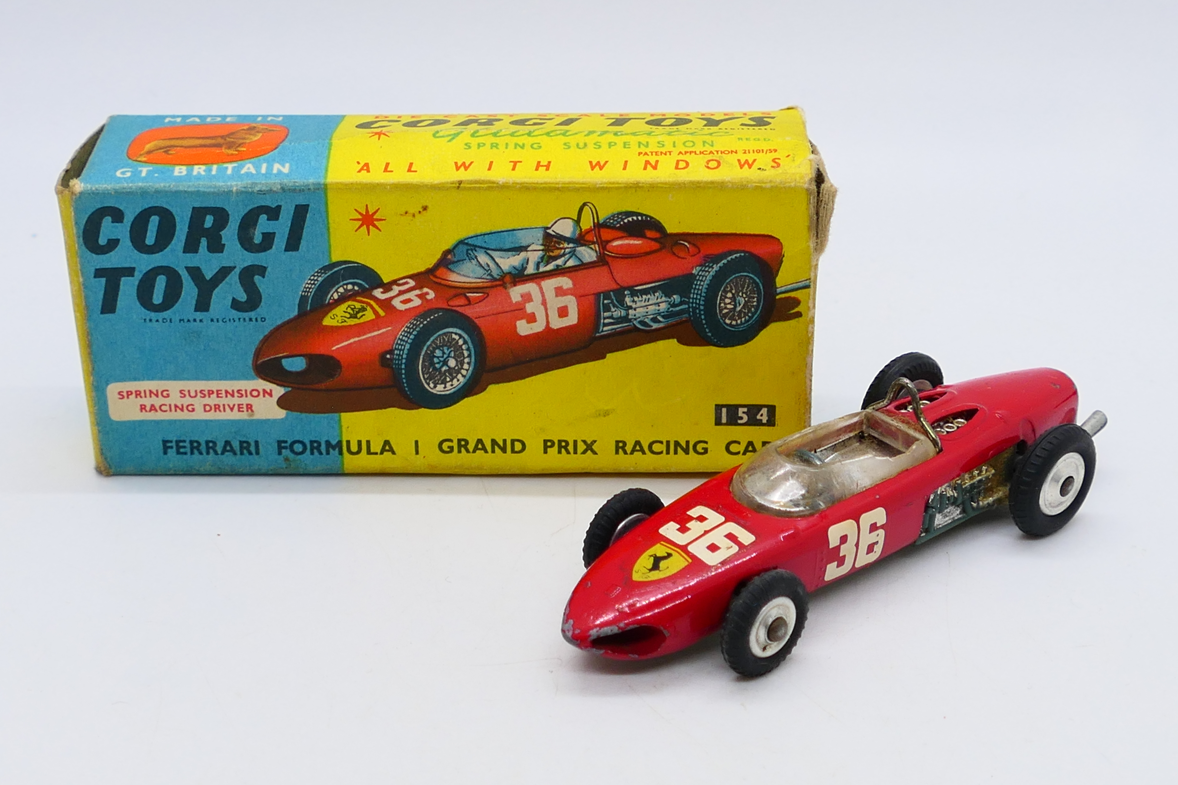 Corgi - A boxed Ferrari Formula 1 Grand Prix racing car in red # 154.