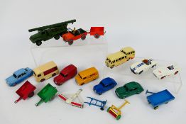 Dinky - A collection of 11 x vehicles and accessories including Morris Oxford # 40g,