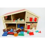 An unbranded Dolls House. Appears as though it was a kit. Included are a family of bears.