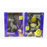 McFarlane Toys - Two boxed 'Shrek' related action figures from McFarlane Toys.