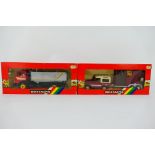 Britains - Two boxed 1:32 scale model vehicles appearing in Mint condition with Excellent boxes.