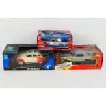 Joyride - Maisto - Solido - Three boxed diecast model cars.