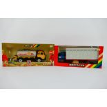 Britains - Two boxed 1:32 scale model vehicles appearing in Mint condition with Excellent boxes.