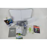 Nintendo - Wii - A Nintendo Wii console with Balance Board, two controllers, power lead,