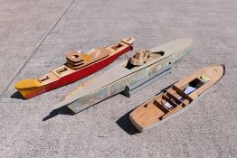 Three part built model radio control vessels.