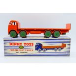 Dinky - A boxed Foden Flat Truck with tailboard in the rare colour scheme of all orange body with