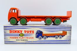 Dinky - A boxed Foden Flat Truck with tailboard in the rare colour scheme of all orange body with