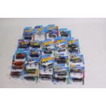 Hot Wheels - 24 carded Hot Wheels diecast vehicles on long and short cards.