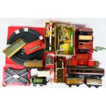 Hornby - Bassett Lowke - A mixed lot of boxed and unboxed O gauge rolling stock and accessories.