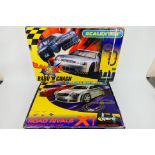 Scalextric - 2 x boxed sets, Road Rivals # C1150 and Bash N Crash # C1077.