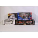 Three boxed diecast large scale models with a Revell plastic model kit.