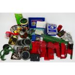 Meccano - A large quantity of predominately red and green Meccano parts and accessories.