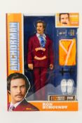 BeeLine - Anchorman - An unopened 13 inch Ron Burgundy Anchorman figure.