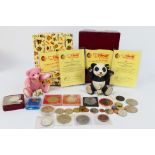 Steiff - Two boxed Steiff porcelain teddy bears with miniature pewter figurines.
