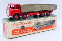Dinky - A boxed Foden Diesel 8 Wheel Wagon in the early colour scheme of red cab,