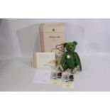 Steiff - A boxed limited edition #408540 mohair green Steiff bear - The '1908 Teddy Bear' has metal