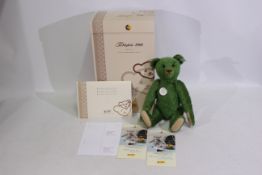 Steiff - A boxed limited edition #408540 mohair green Steiff bear - The '1908 Teddy Bear' has metal